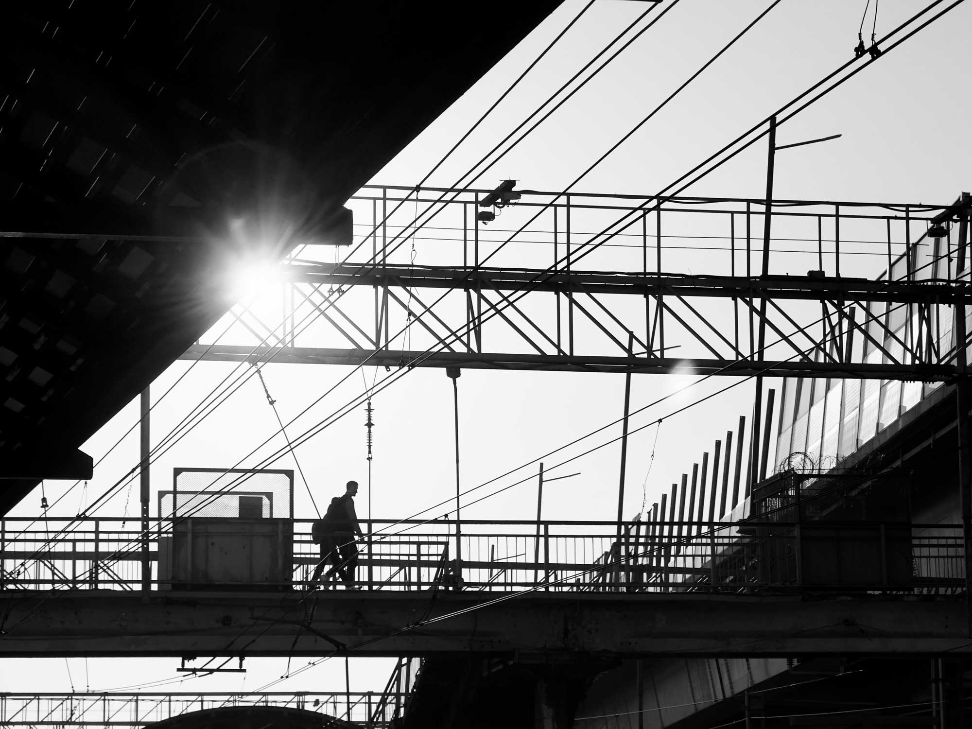 perspective-people-crossing-overpass